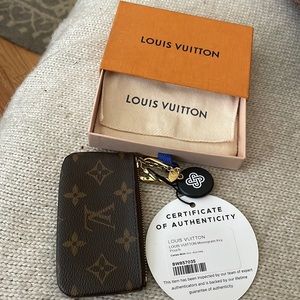 Louis Vuitton card key case.